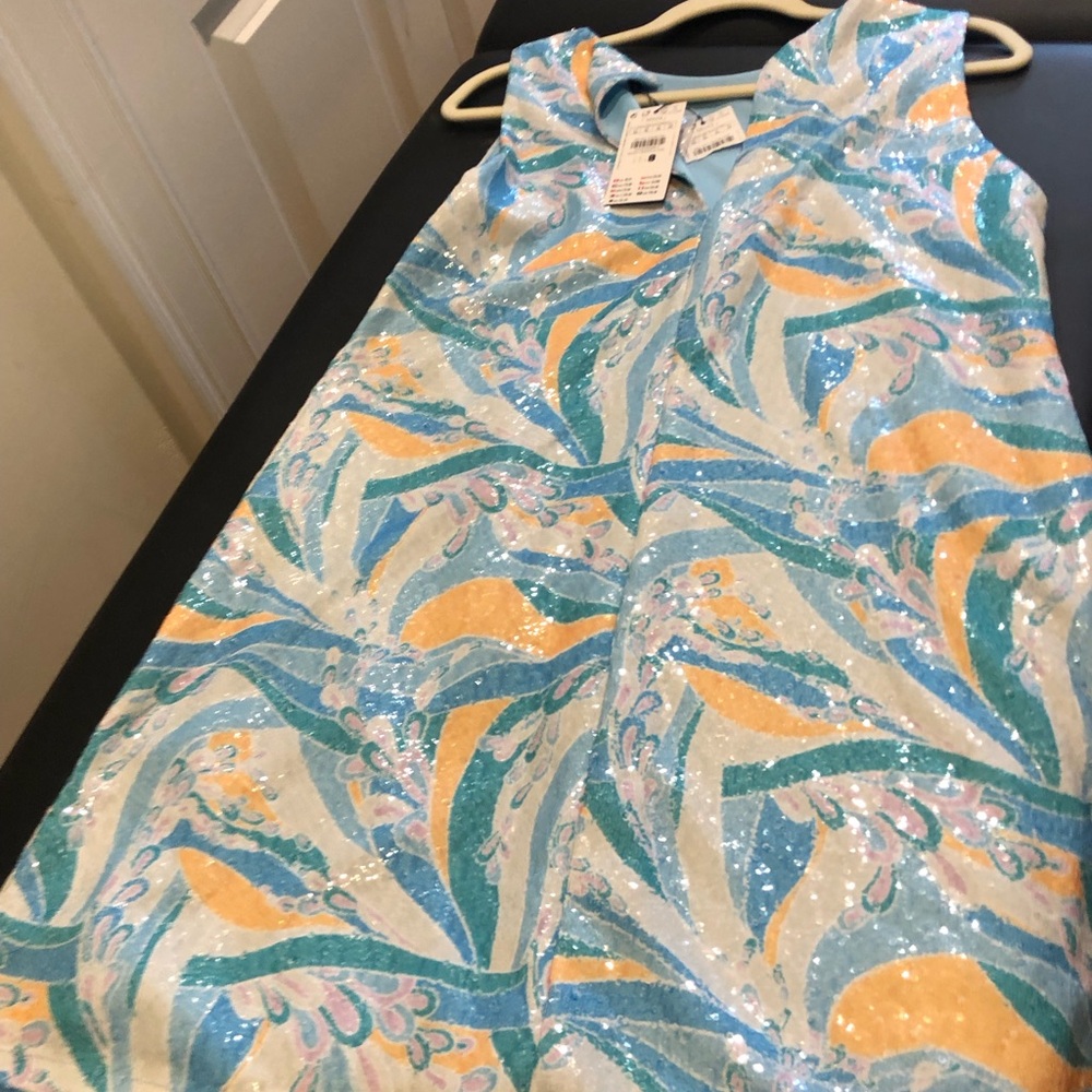 Sparkly beautiful dress new with tags.  Xl. Got this in France